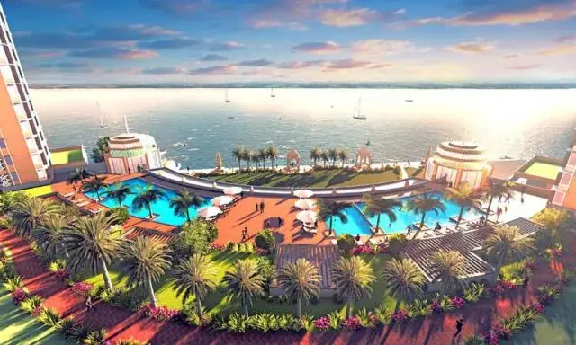 Riverfront pool deck and clubhouse at Alcove New Kolkata