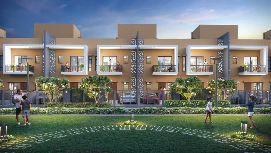 Resident lawn and play area between row houses at SP One Estate