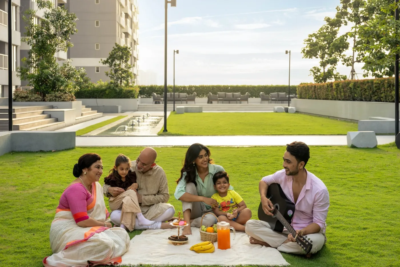 Families on the podium lawn at One10, New Town