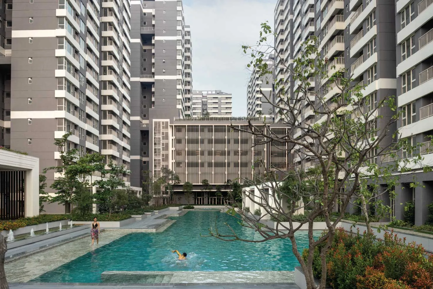 One10 towers around the Olympic-length pool, New Town Action Area I