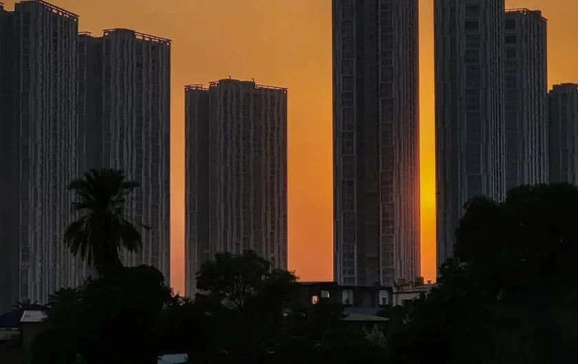 Shriram Grand City towers at sunset, Uttarpara, home of Shriram Springfield duplexes