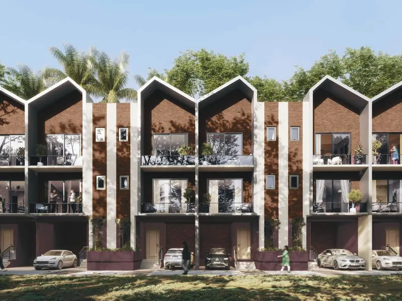 Row villas with gabled roofs at Sugam Villa 18, Narendrapur